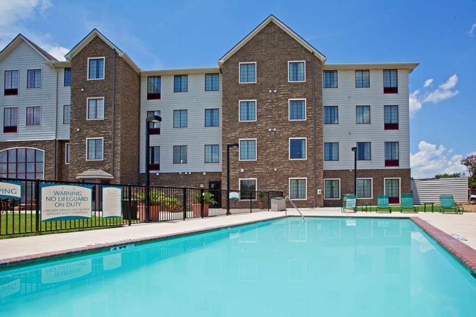 Outdoor pool with lounge seating for a perfect sunny day.