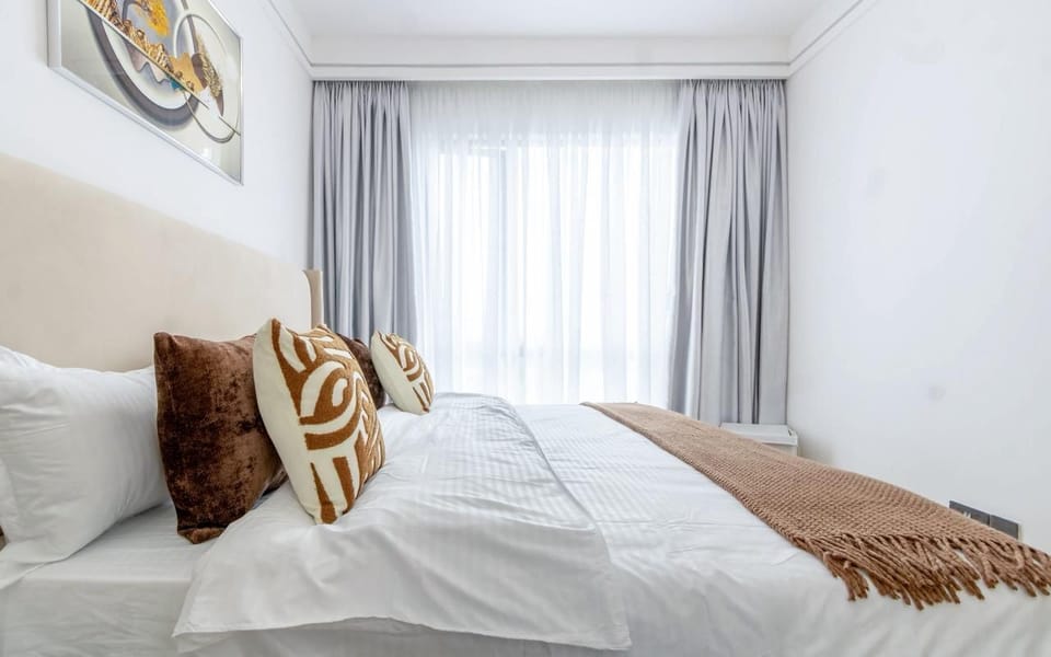 Classic Apartment, Balcony, City View | In-room safe, desk, laptop workspace, iron/ironing board