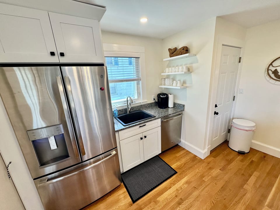 Large fridge with water dispenser.
