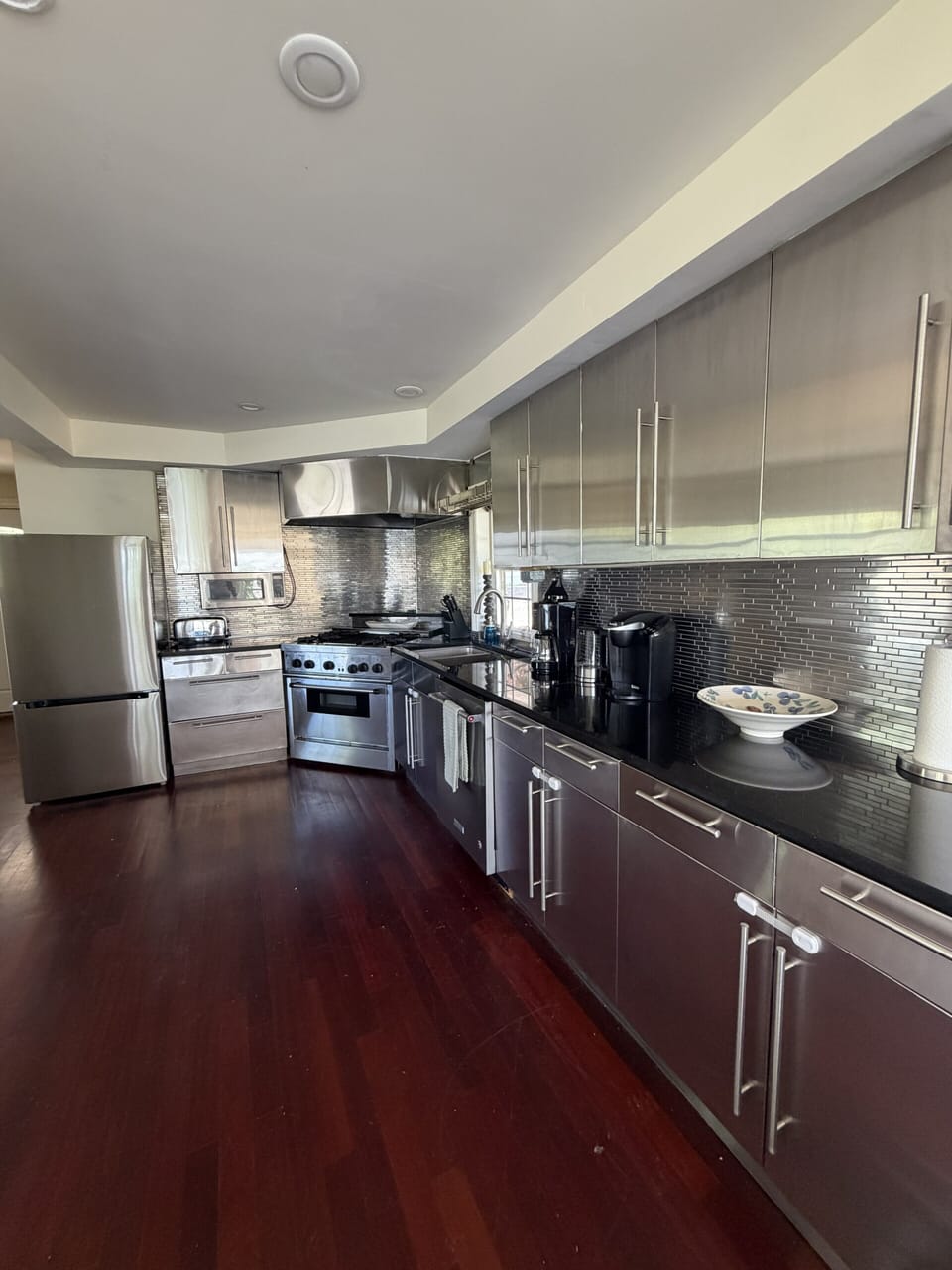 Modern chef’s kitchen with stainless appliances and sleek finishes