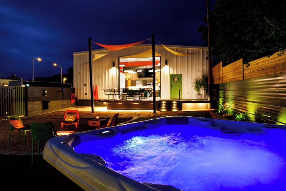Relax under the Kanab night sky in your private hot tub at Bike Barn! Experience indoor-outdoor living at its best.