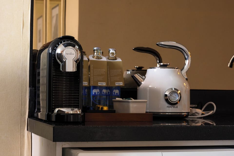 Convenient in-room coffee and tea station with espresso machine