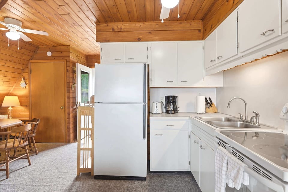 The full kitchen adds convenience for weekend getaways and longer stays.