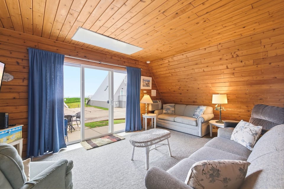 Rainbow Inn living area opens to the patio, making it easy to enjoy resort life.