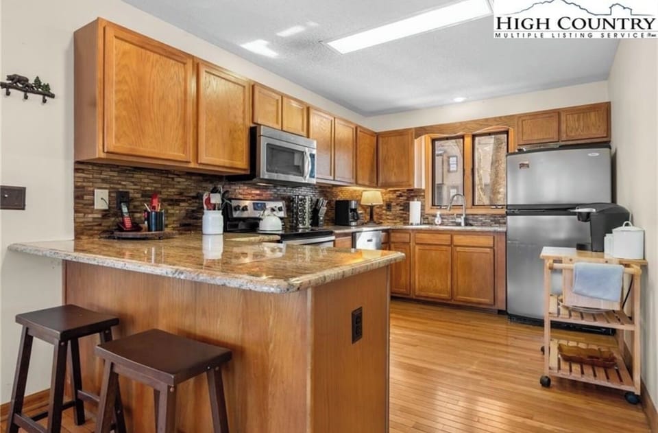 The open-concept kitchen keeps everyone connected.