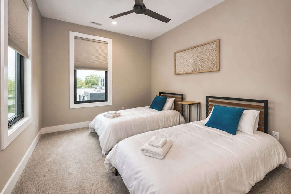 Fifth Bedroom | Two Cozy Single Beds