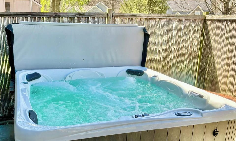 This brand new Hot Springs tub offers powerful jets to soothe the stress away!