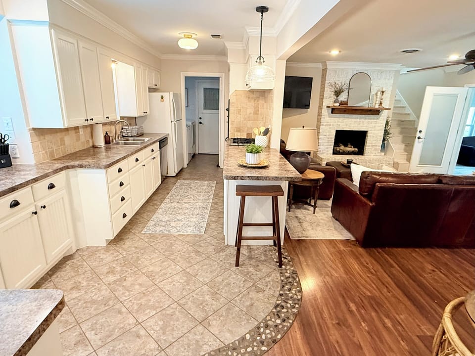 Kitchen opens up to the Living and dining room, with a peninsula
