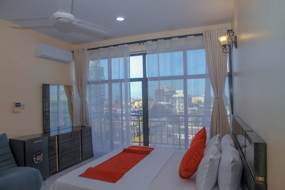 Executive Suite, Balcony, City View | Desk, laptop workspace, free WiFi