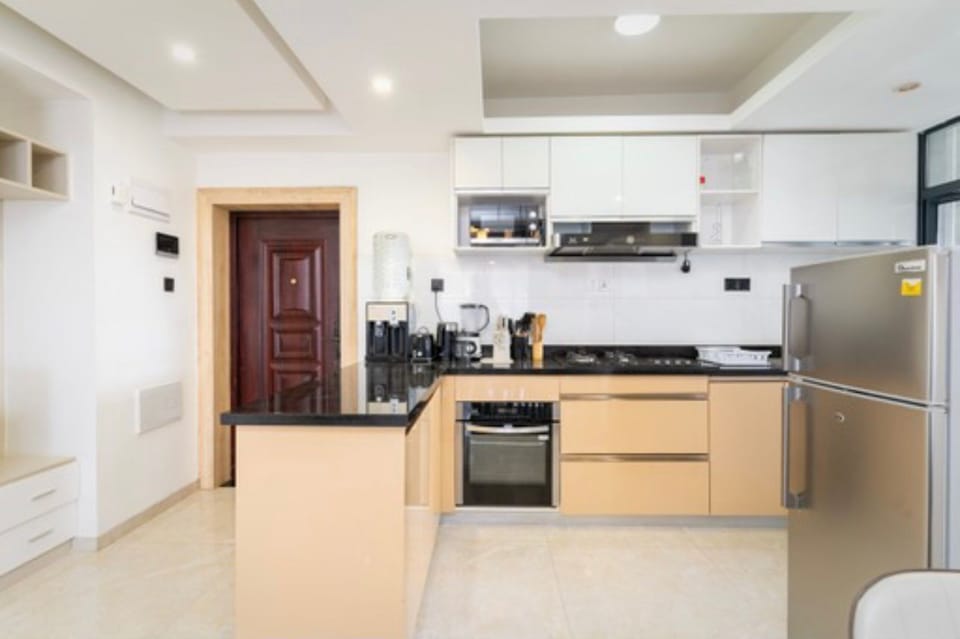 Classic Apartment, Balcony, City View | Private kitchen | Full-size fridge, microwave, oven, stovetop