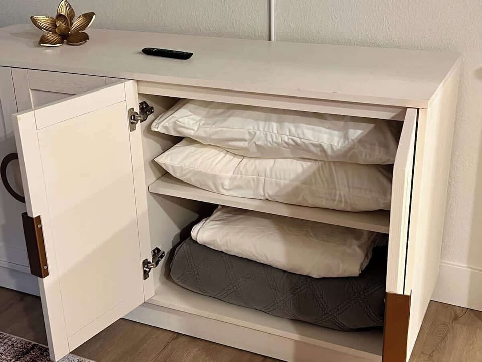 Linens for pull out Murphy found in king bedrooms dresser area