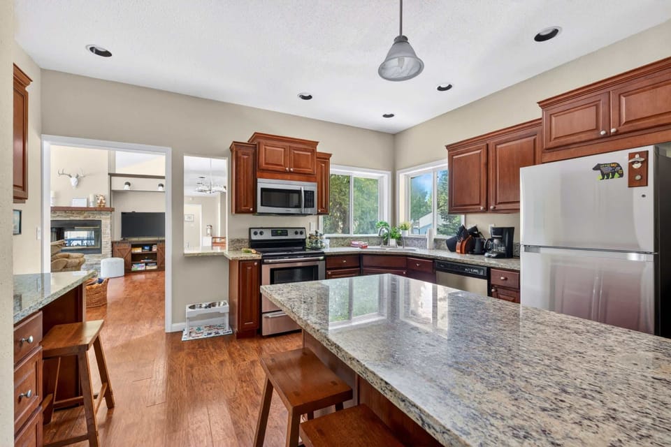 Kitchen with island and plenty of prep space.