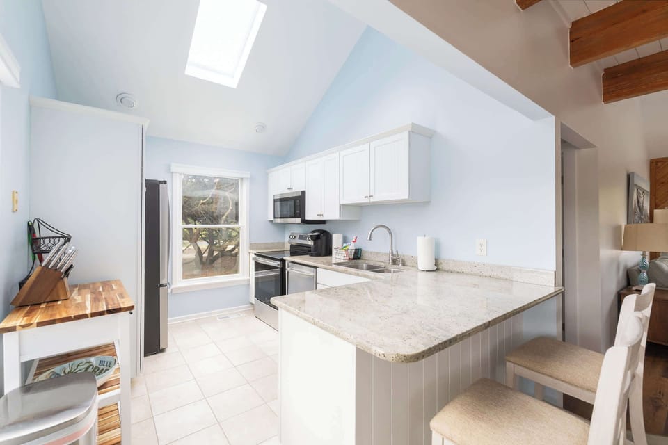 Fully Stocked Kitchen w/ Fridge, Dishwasher, Microwave, Toaster, Coffee Maker on the top level