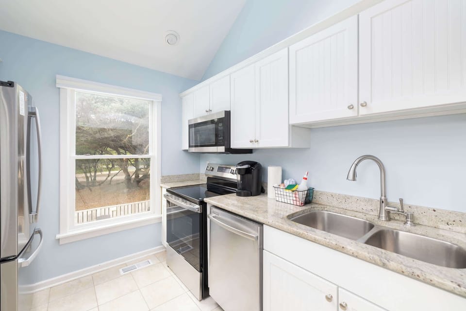 
Fully Stocked Kitchen w/ Fridge, Dishwasher, Microwave, Toaster, Coffee Maker on the top level
