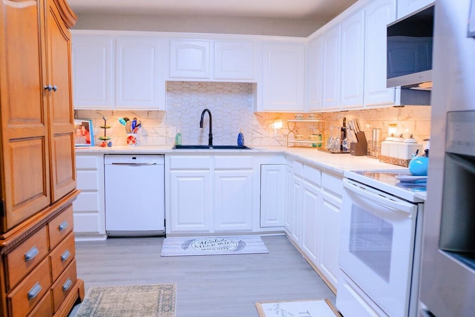 The well-lit kitchen provides everything you need to craft a delicious home-cooked meal, if desired.