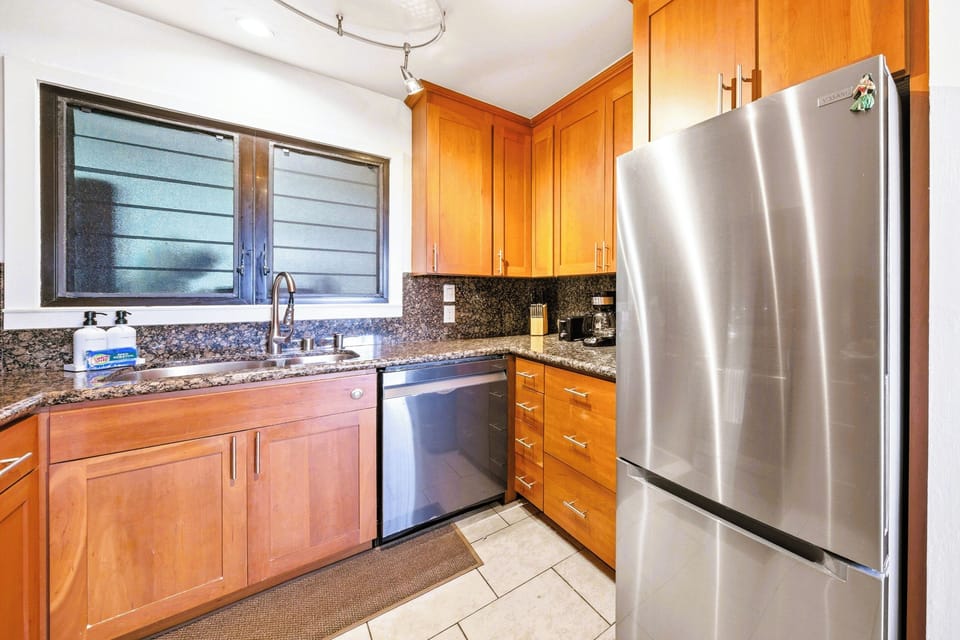 A full kitchen stocked for slow mornings and home-cooked island dinners.