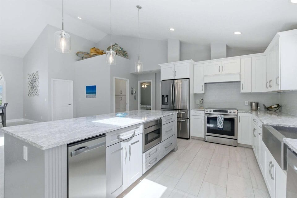 Beautiful, bright, fully-equipped kitchen with huge pass-through window