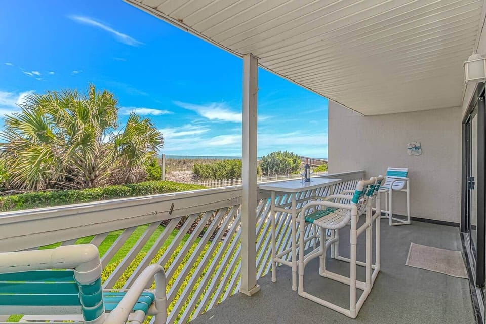Private oceanfront balcony with breathtaking beach views just steps from the sand.