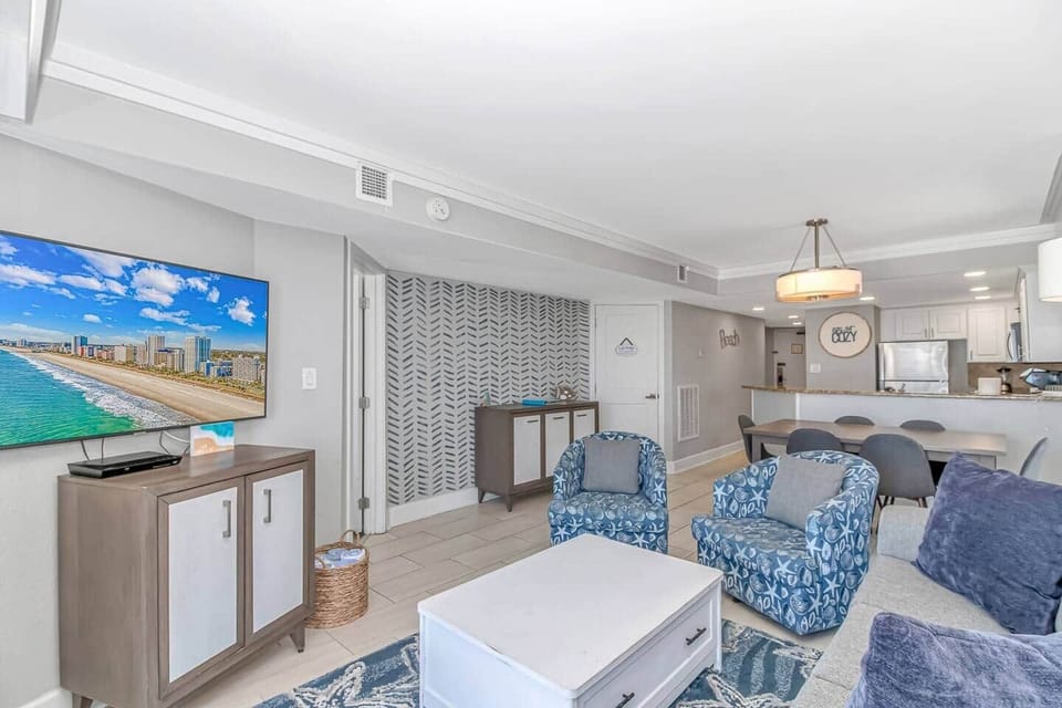 Updated Oceanfront Condo Living Room w/ Open Layout & Coastal Decor