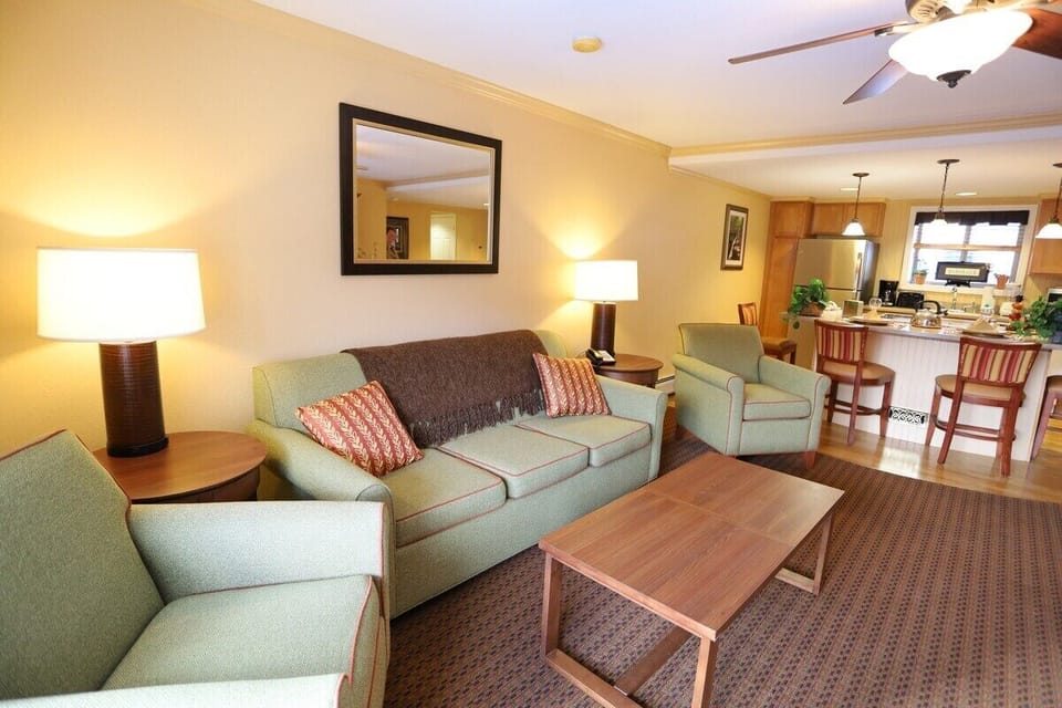 Open living, kitchen, and dining area at resort condominium