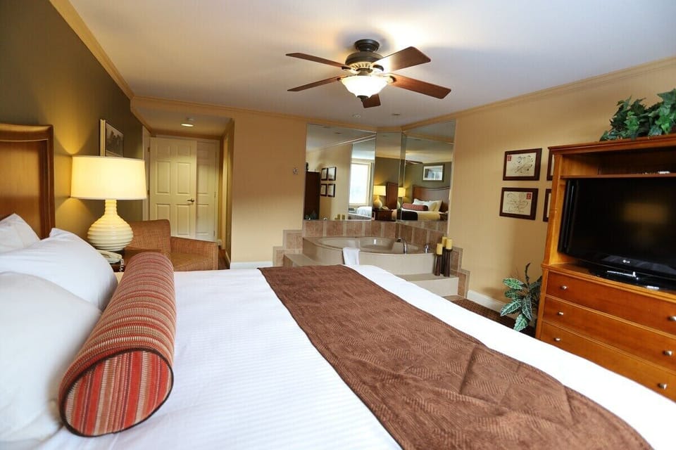King size master bed in master suite condo