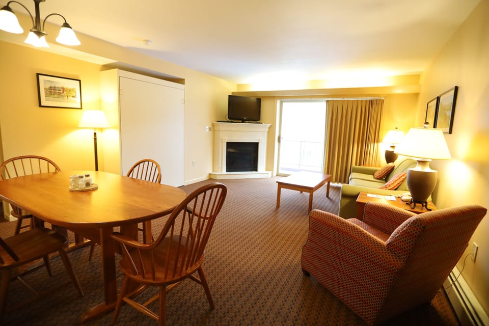 Living Room with Murphy Bed in Pollard Brook Condo