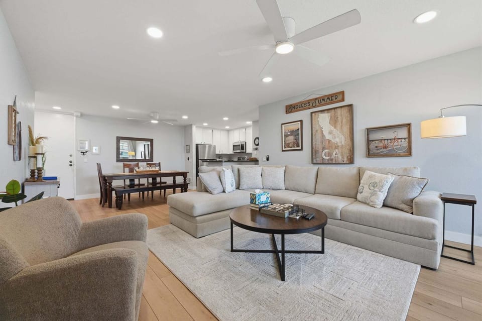 Spacious sectional converts to a queen-sized sofa sleeper to accommodate additional guests.