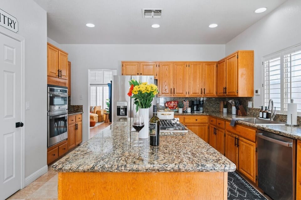 Kitchen: Designed for those chaotic, laughter-filled holiday mornings where everyone lends a hand.
