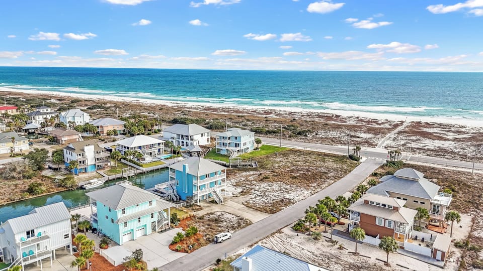 3 Minute walk to PRIVATE neighborhood beach!  We provide beach carts/chairs/etc!