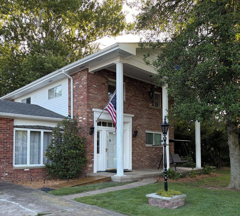 Brick and front door are from the first house built on the property in 1845. 