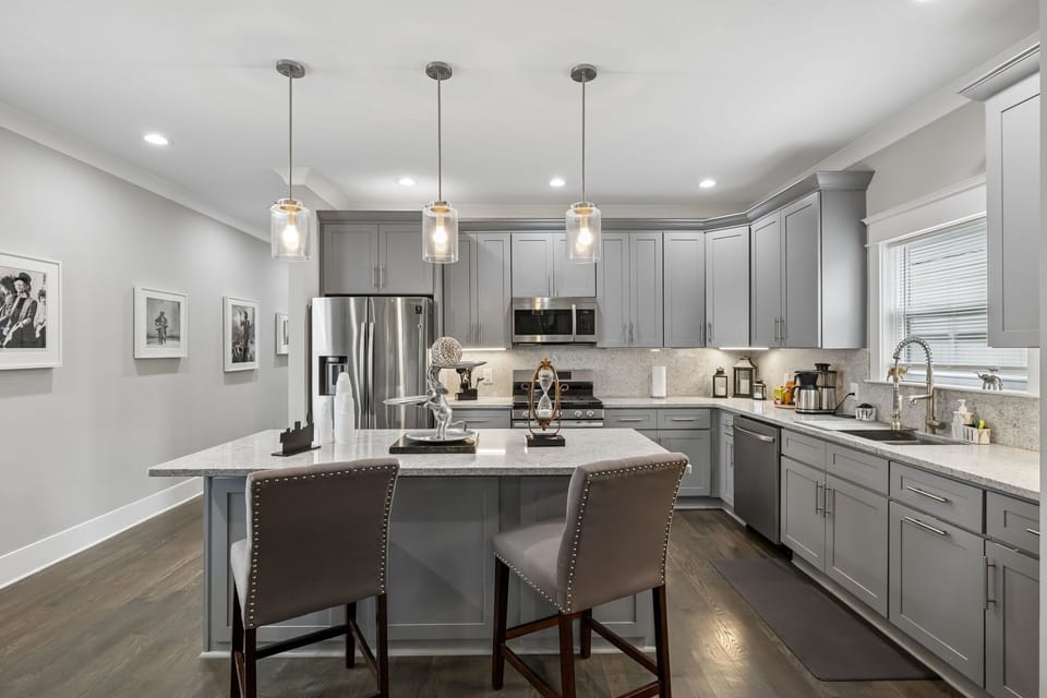 Kitchen: The fully equipped kitchen and dining area make meals easy, whether you're preparing breakfast or enjoying dinner together. Features modern appliances, ample counter space, and comfortable seating.