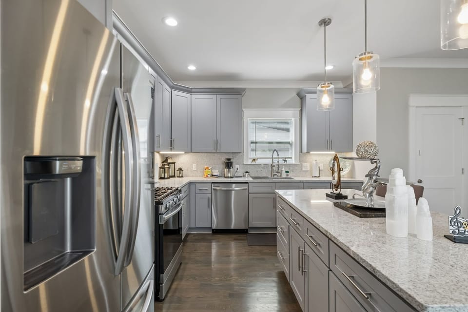 Kitchen: The fully equipped kitchen and dining area make meals easy, whether you're preparing breakfast or enjoying dinner together. Features modern appliances, ample counter space, and comfortable seating.