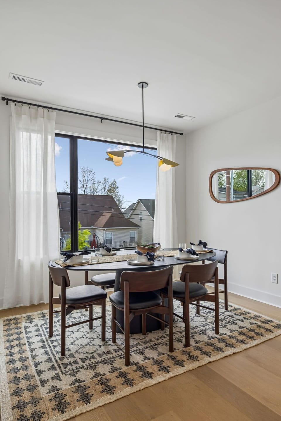 Dining Area: Enjoy meals together in the welcoming dining area featuring comfortable seating and a bright, inviting atmosphere perfect for family gatherings.
