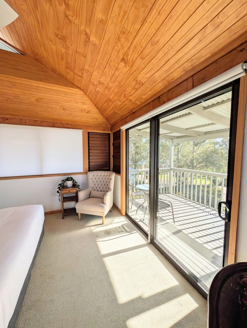 The master suite opens directly onto its own private balcony with treetop outlook and filtered golf course views. A table for two for peaceful moment away. Separate from the main entertaining level — genuinely private.