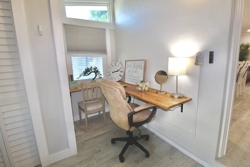 The corner workspace of Bedroom 3, offers a quiet office space for business travelers or students.