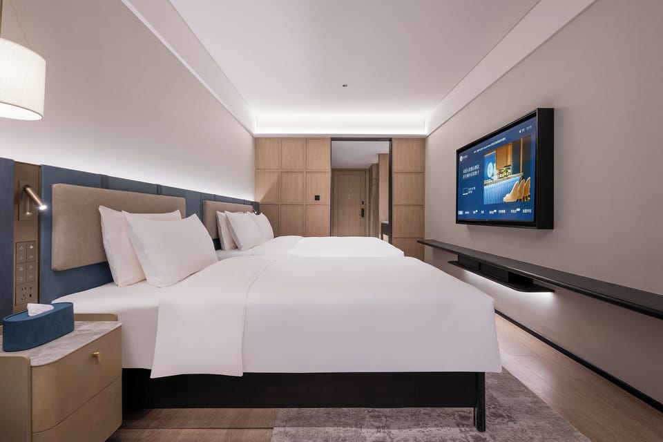 Family Twin Room, City View | Desk, laptop workspace, blackout drapes, soundproofing