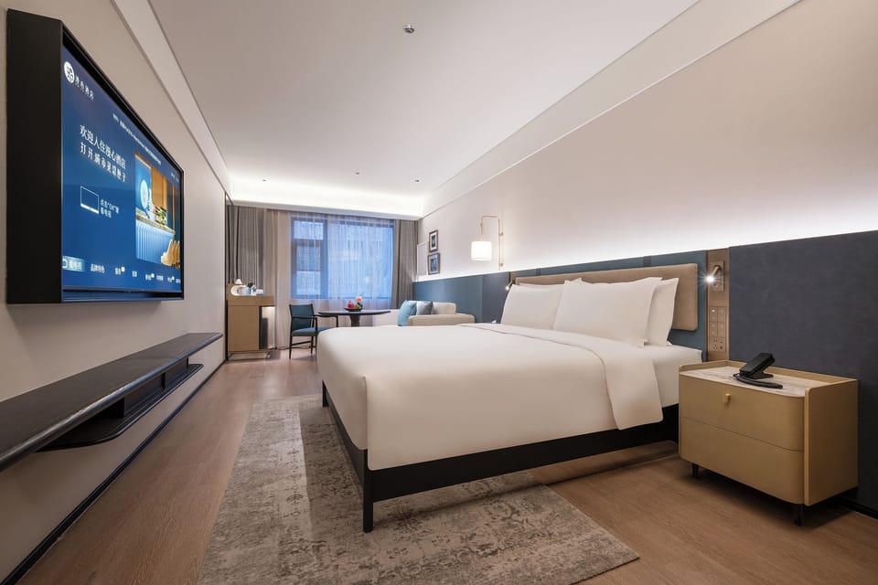 Luxury Double Room, City View | Desk, laptop workspace, blackout drapes, soundproofing