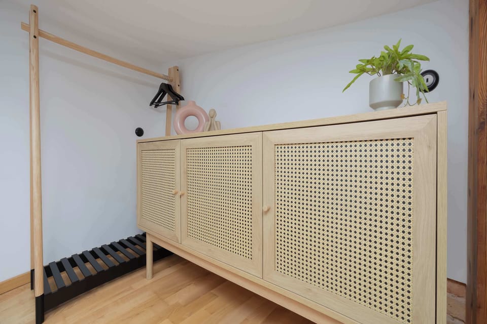 Functional storage space located beneath the loft.