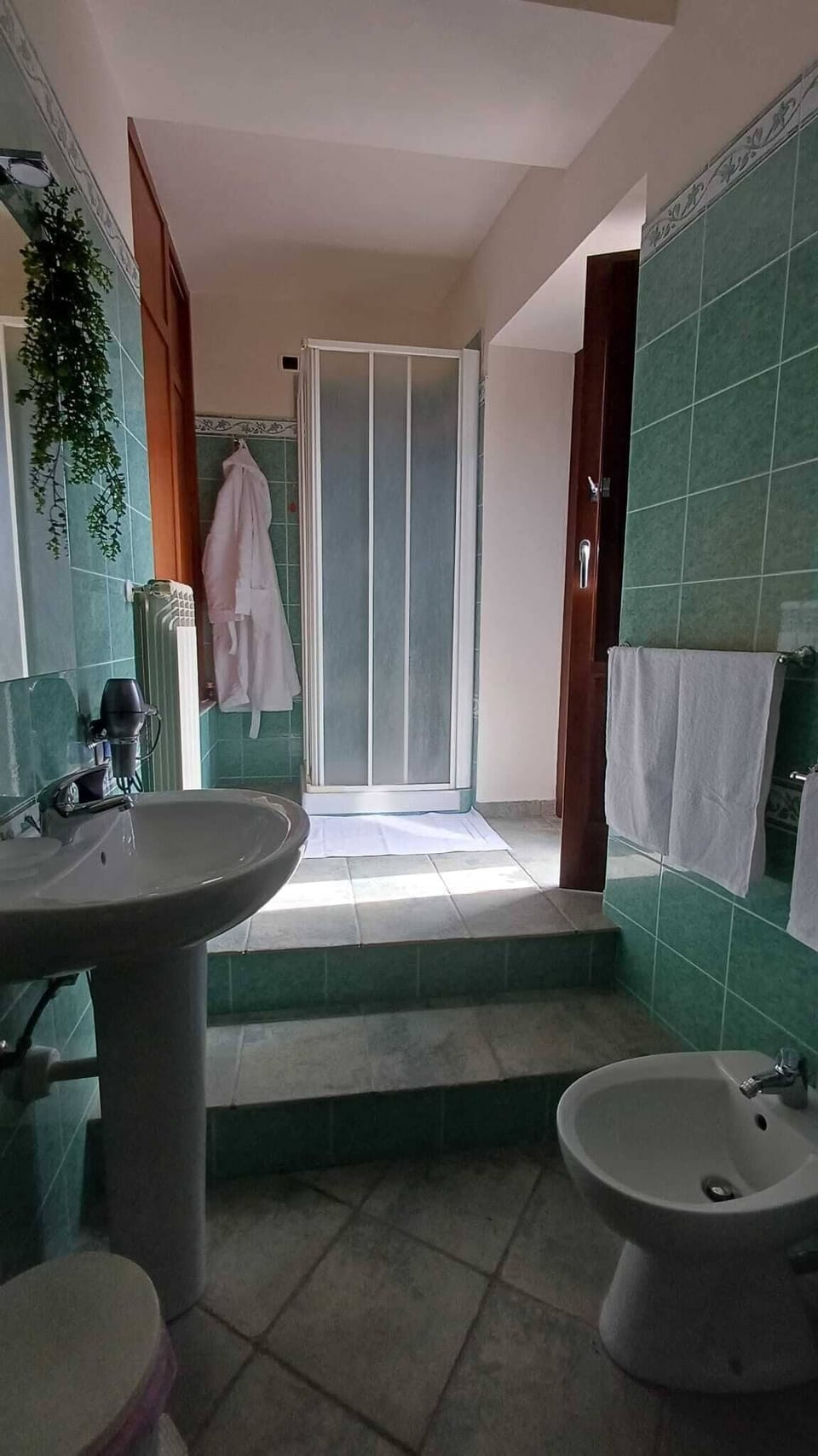 Family Triple Room | Bathroom | Shower, free toiletries, hair dryer, slippers