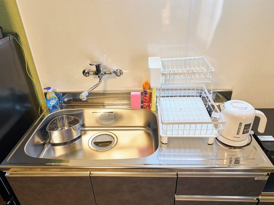 Apartment, 2 Bedrooms, Non Smoking | Private kitchen | Full-size fridge, microwave, stovetop, cookware/dishes/utensils