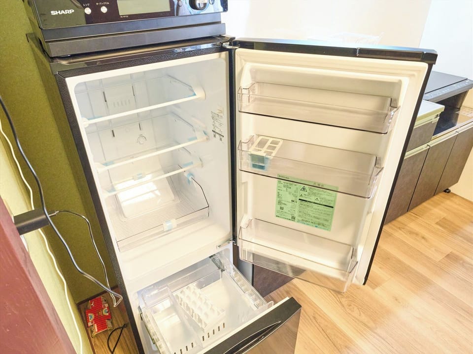 Apartment, 2 Bedrooms, Non Smoking | Private kitchen | Full-size fridge, microwave, stovetop, cookware/dishes/utensils