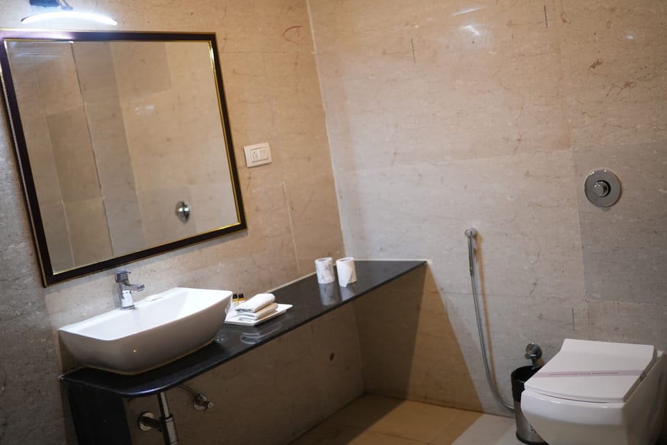 Superior Suite, Mountain View | Bathroom | Shower, hair dryer, slippers, towels