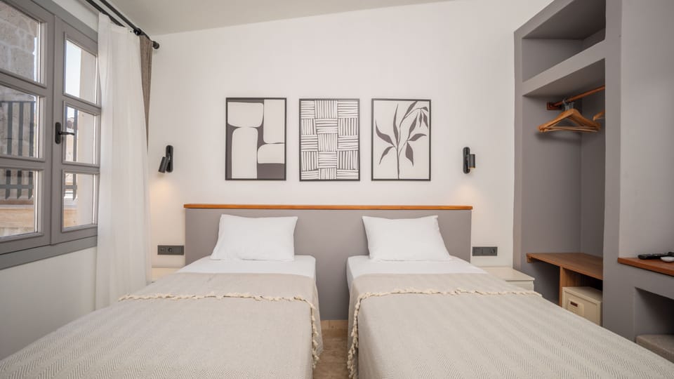 Standard Double or Twin Room | Minibar, in-room safe, desk, laptop workspace