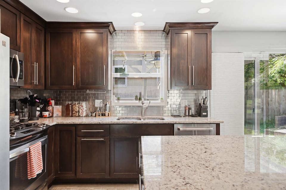Granite countertops and ample prep space make cooking easy during your stay.
