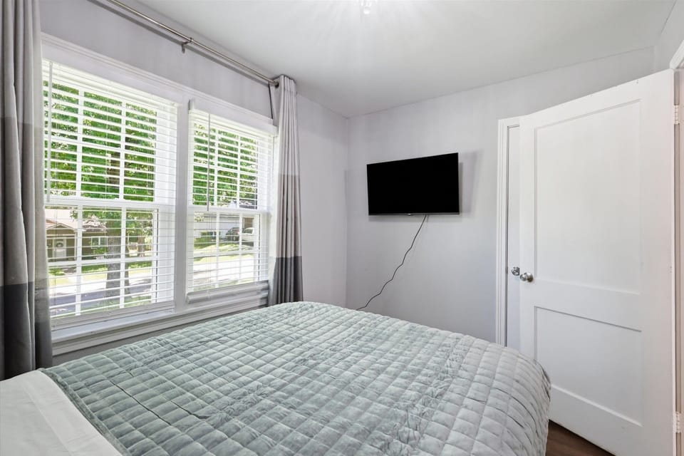 Stream your favorite shows on the Smart TV in the third full bedroom.