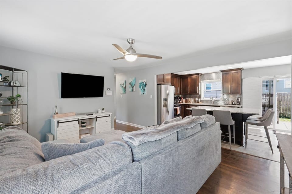 The bright, open living area offers plenty of space to relax after a day exploring Kansas City.