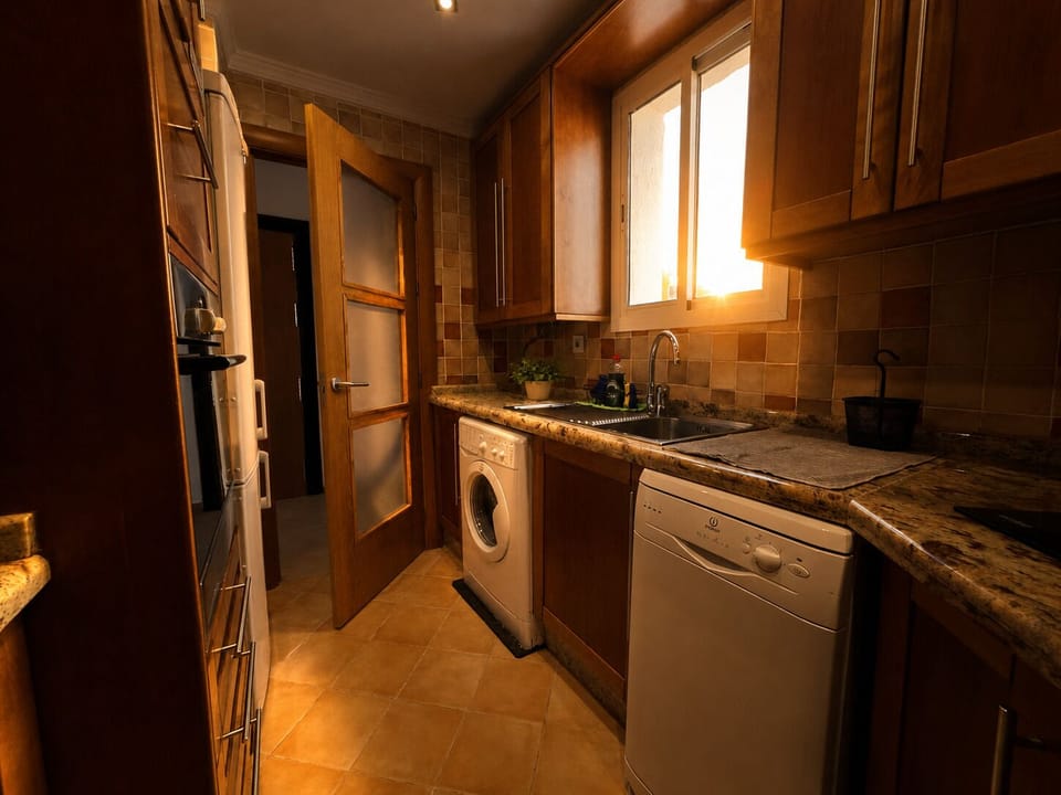Compact Kitchen With Wooden Cabinets