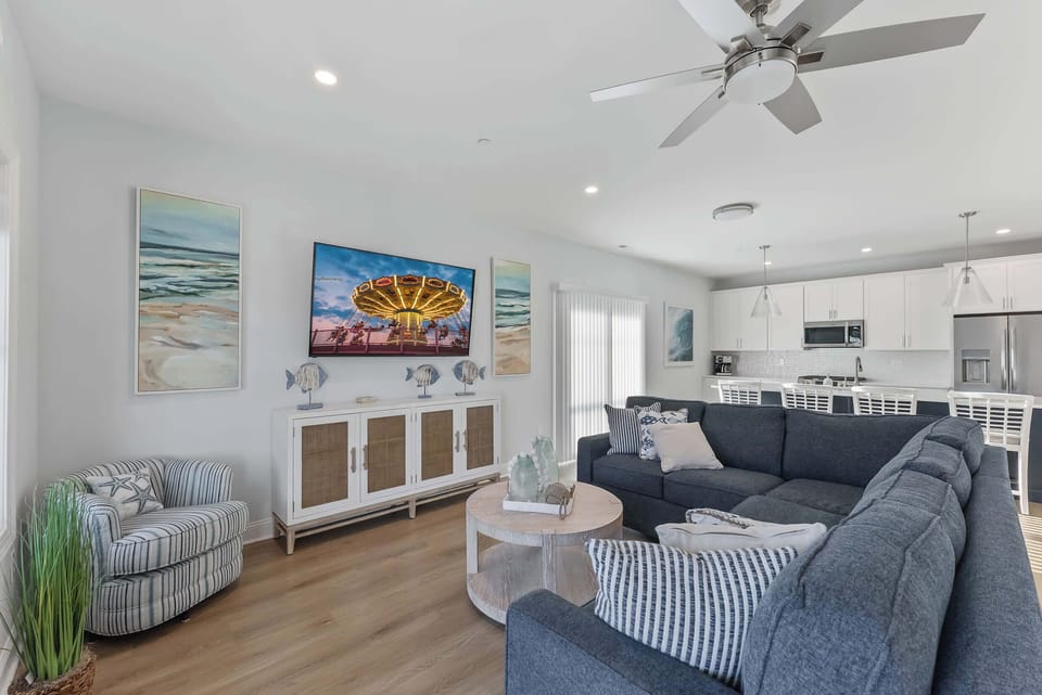 Open-concept living with cozy seating, a smart TV, and plenty of room to gather.