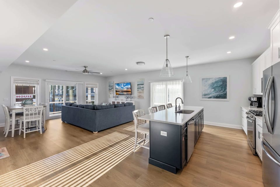 Bright and spacious kitchen with island seating and seamless access to the living area.