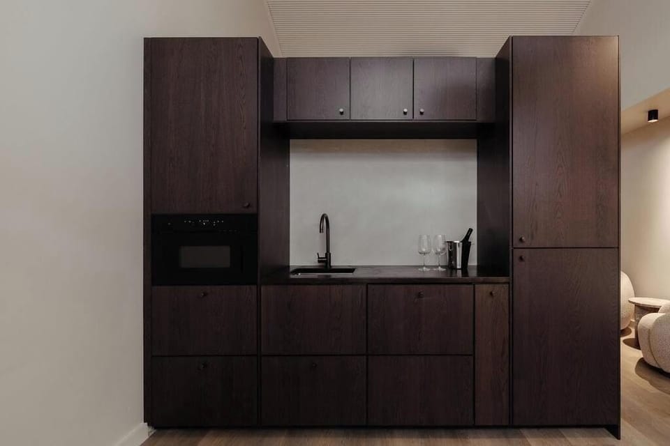 Minimal kitchen design keeps the space calm and uncluttered.